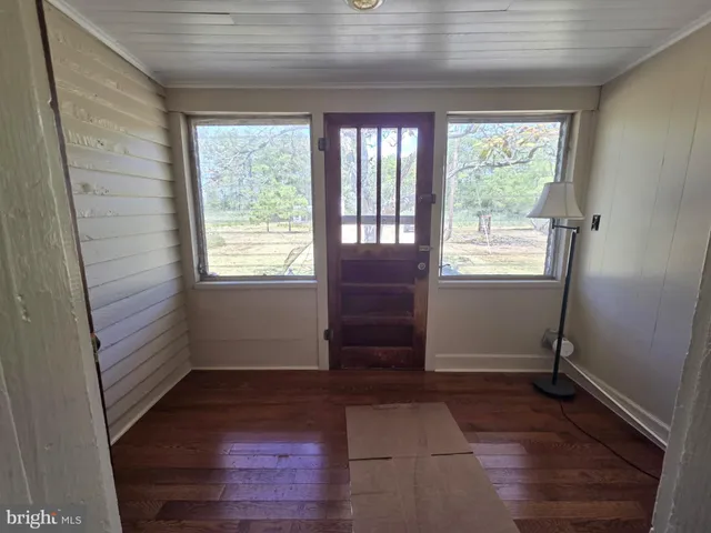 a view of a chairs and table in a yard