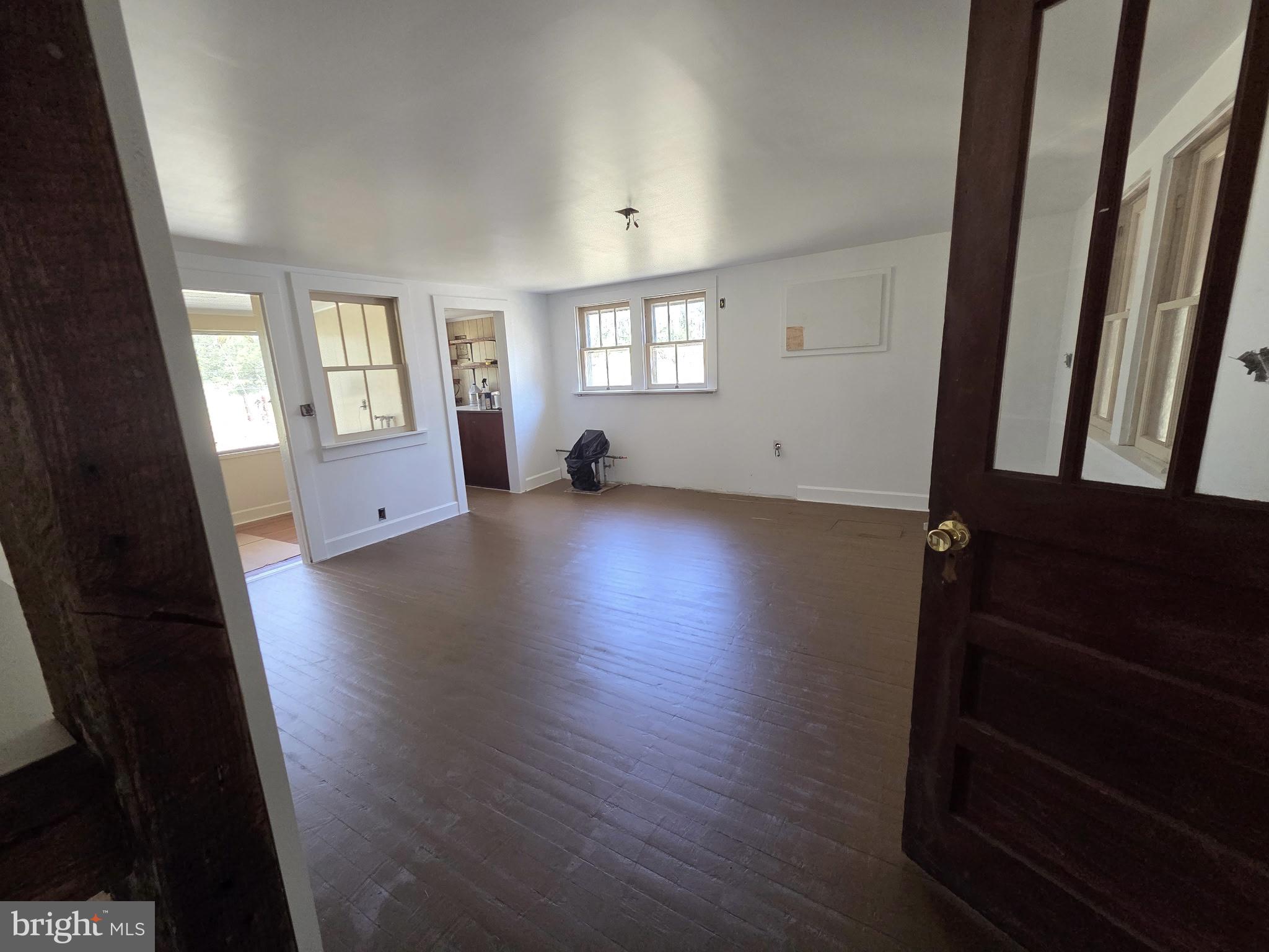 Brady Todd Road Crocheron, MD 21627 - Photo 49 of 111 wooden floor in an empty room with a window