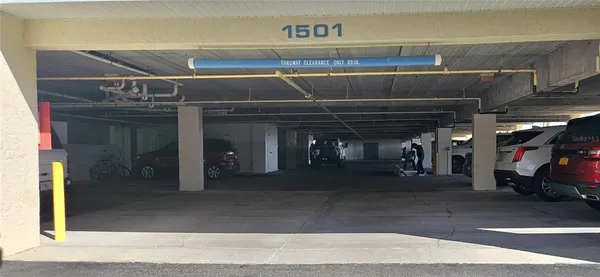 a view of a building with a garage