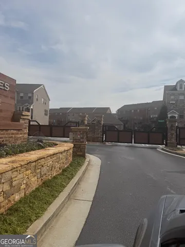 a view of kitchen and dining room with wooden floor