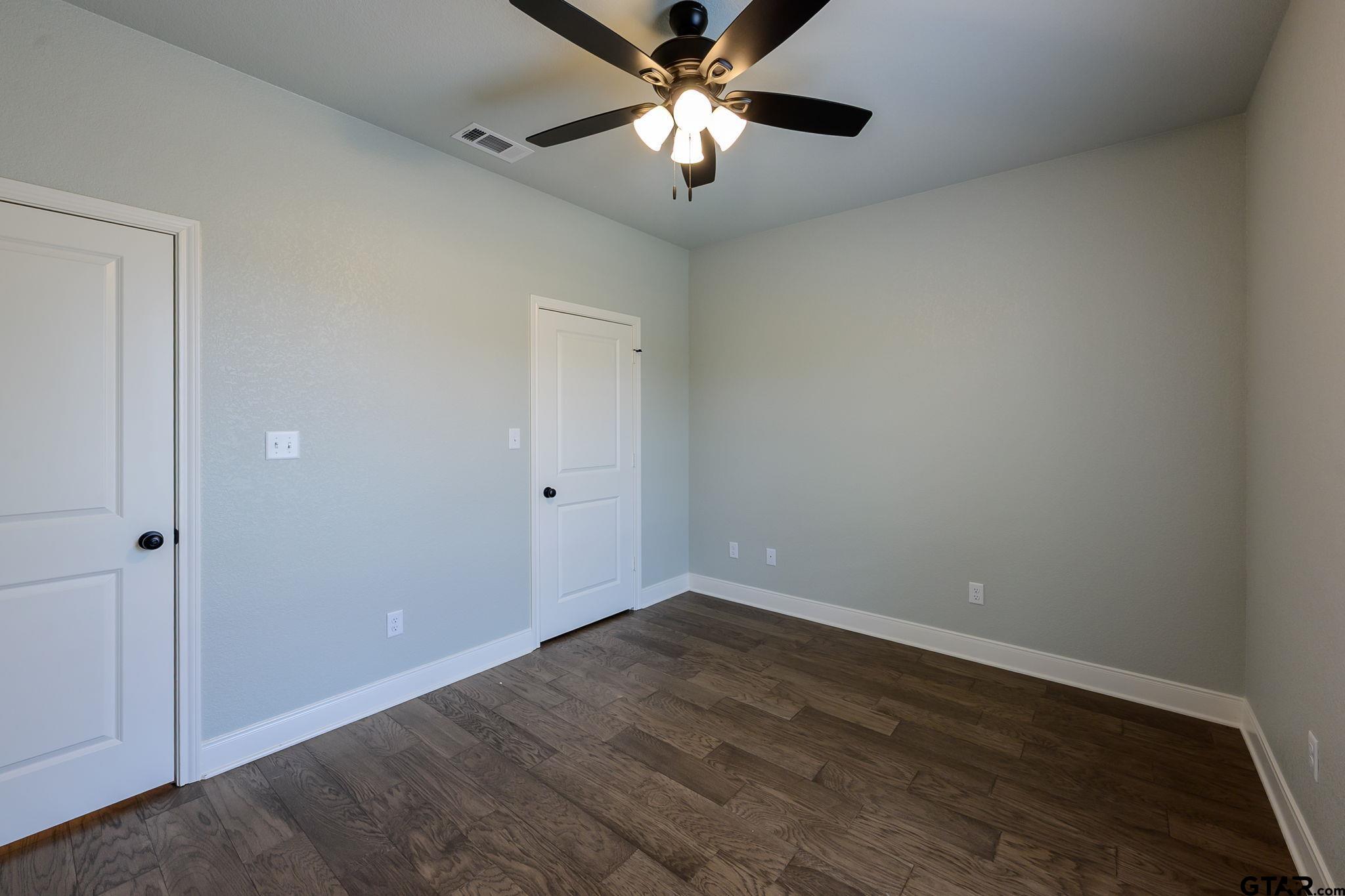 11858 Gillian Court Tyler, TX 75703 - Photo 16 of 24 wooden floor in an empty room