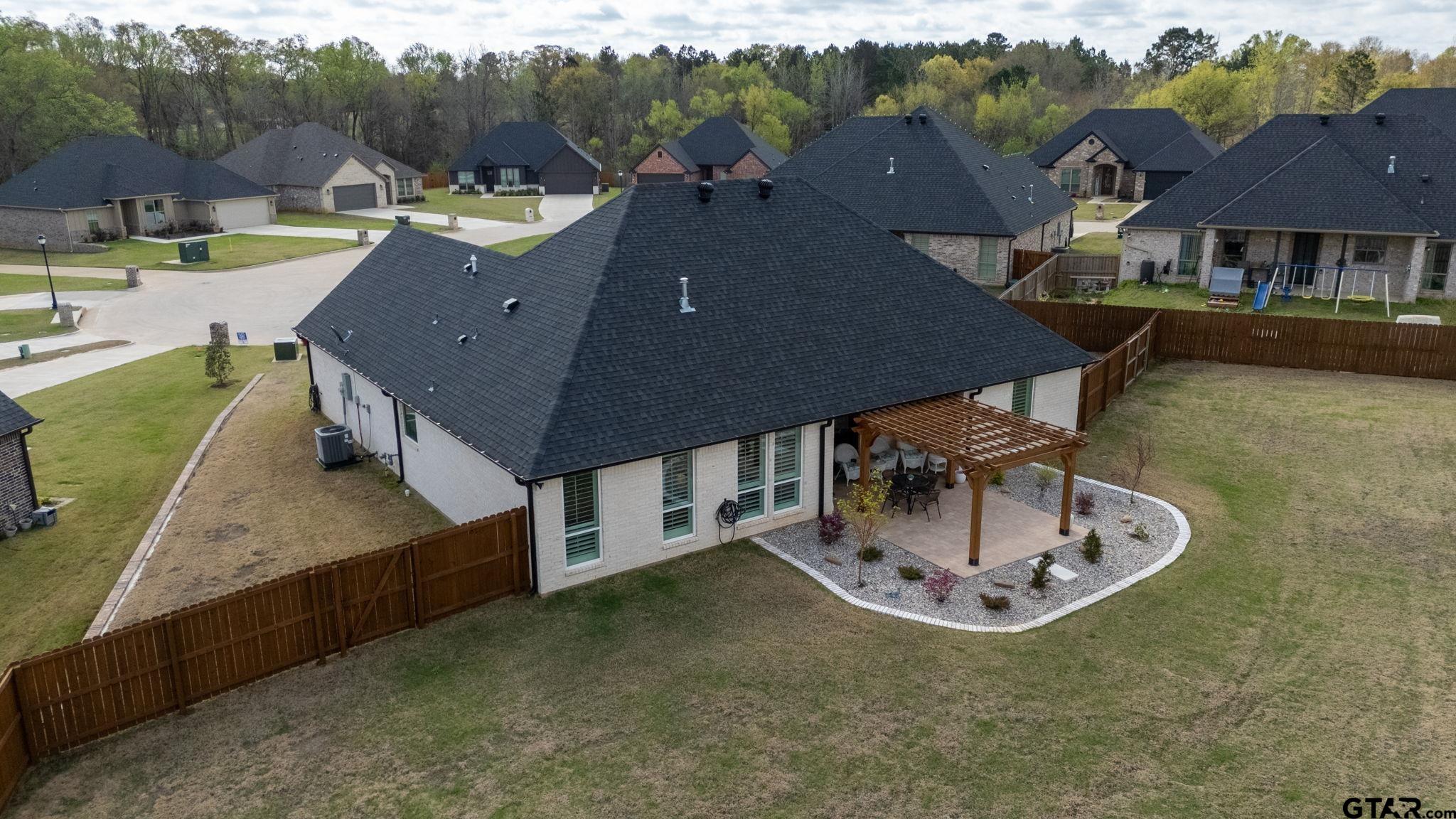 11858 Gillian Court Tyler, TX 75703 - Photo 22 of 24 an aerial view of a house with outdoor space