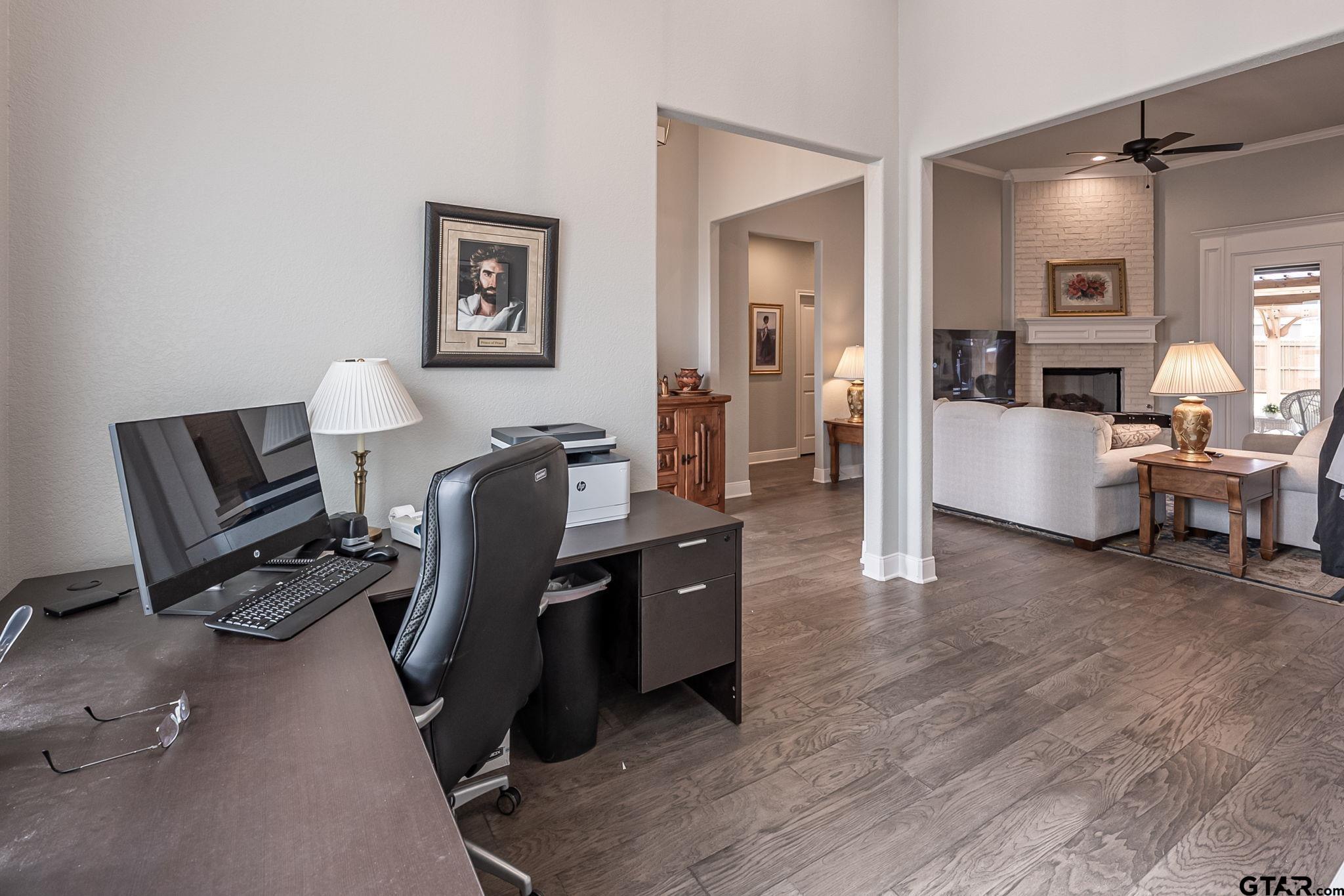 11858 Gillian Court Tyler, TX 75703 - Photo 6 of 24 a view of a livingroom with workspace and a couch