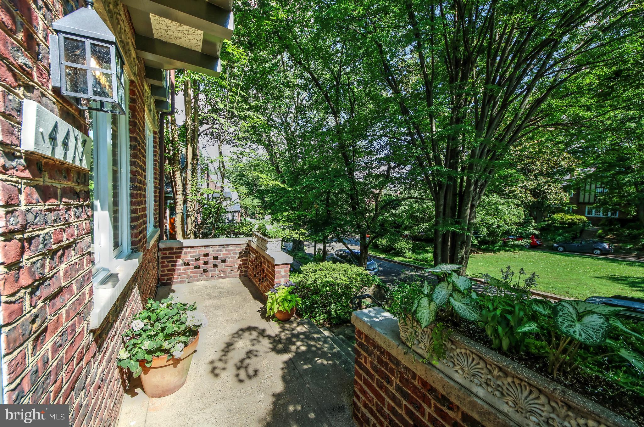 4417 Q Street Northwest Washington, DC 20007 - Photo 2 of 29 Front Patio with southern exposure & a green view
