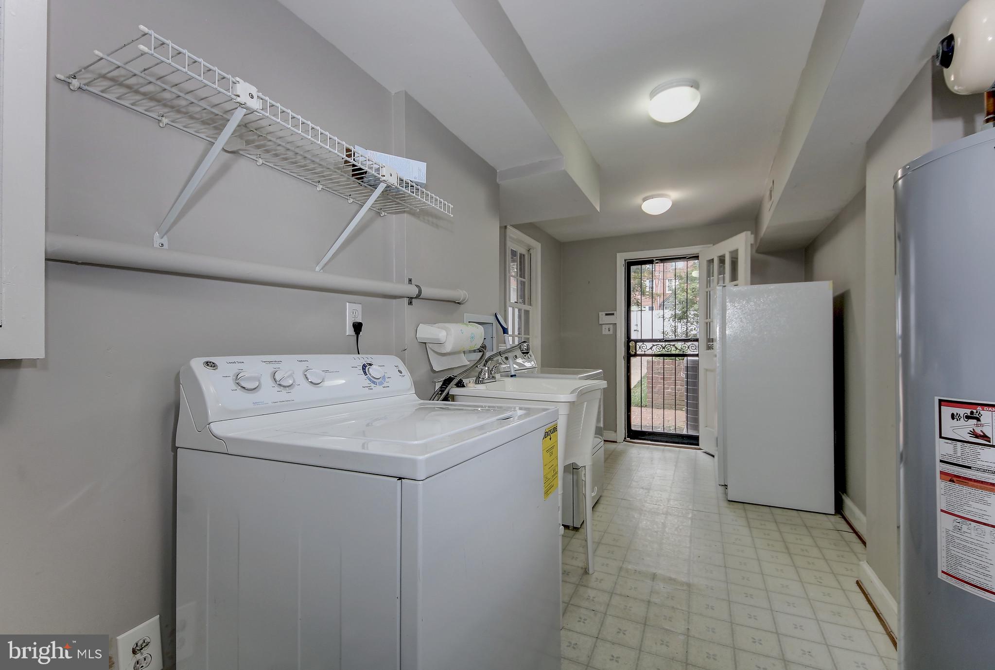 4417 Q Street Northwest Washington, DC 20007 - Photo 26 of 29 Bright Spacious Laundry Room