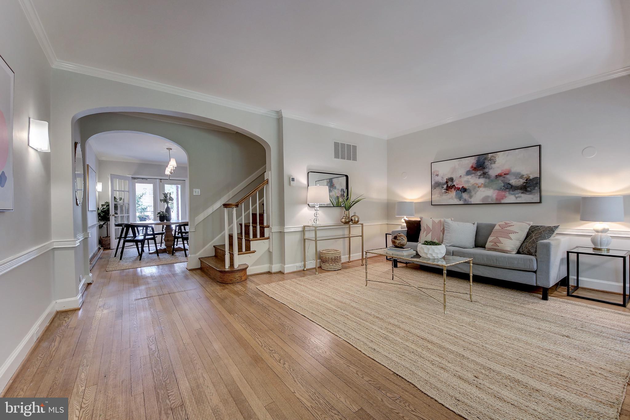 4417 Q Street Northwest Washington, DC 20007 - Photo 4 of 29 Living Room with Dining Room in background