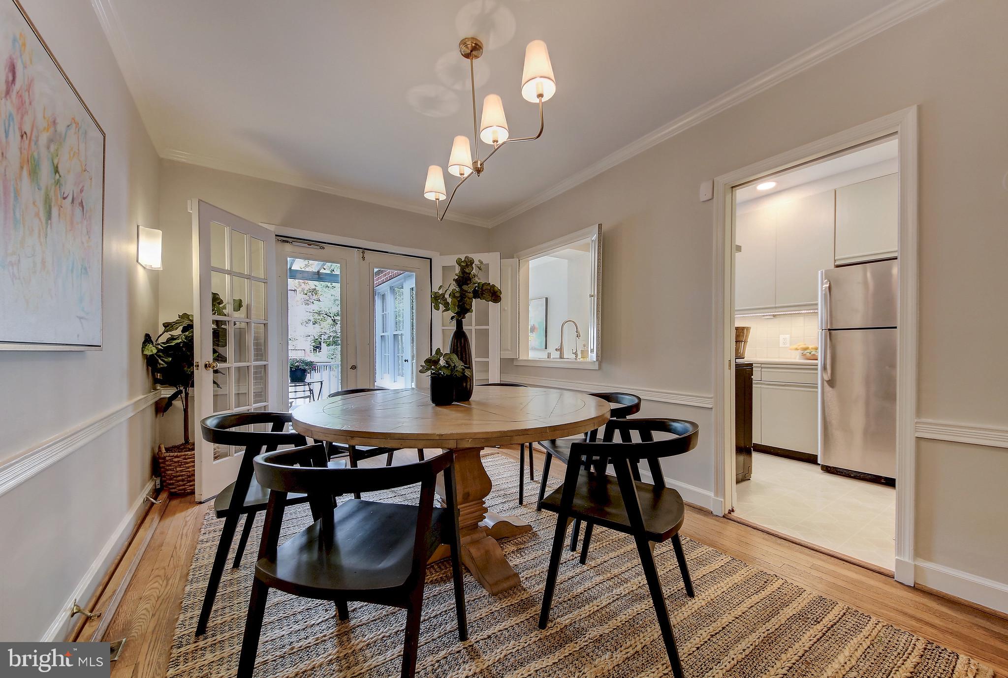 4417 Q Street Northwest Washington, DC 20007 - Photo 5 of 29 Dining Room, French Doors & Kitchen Pass Thru