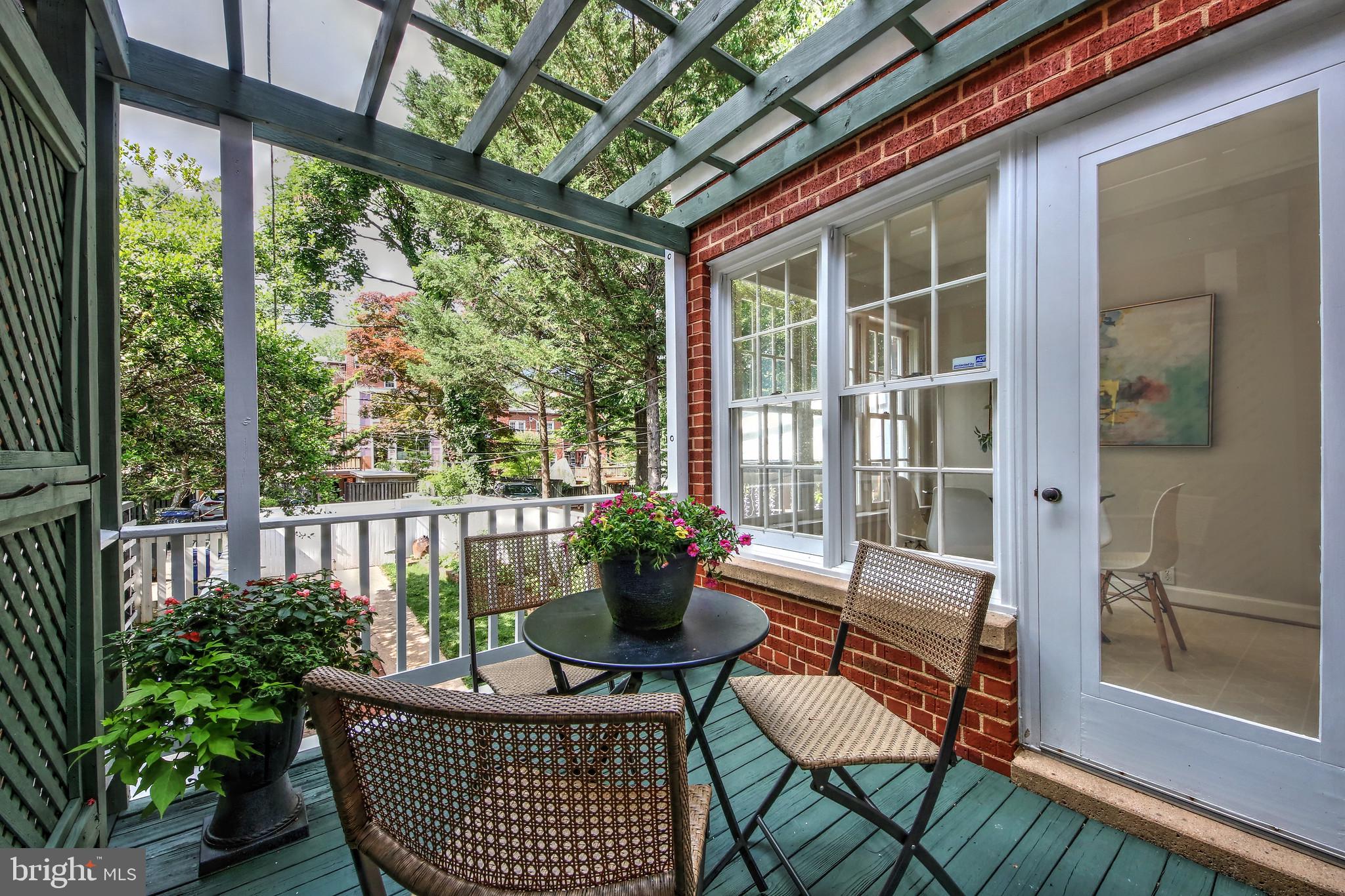4417 Q Street Northwest Washington, DC 20007 - Photo 7 of 29 Rear Deck overlooks Fenced Yard/Garden