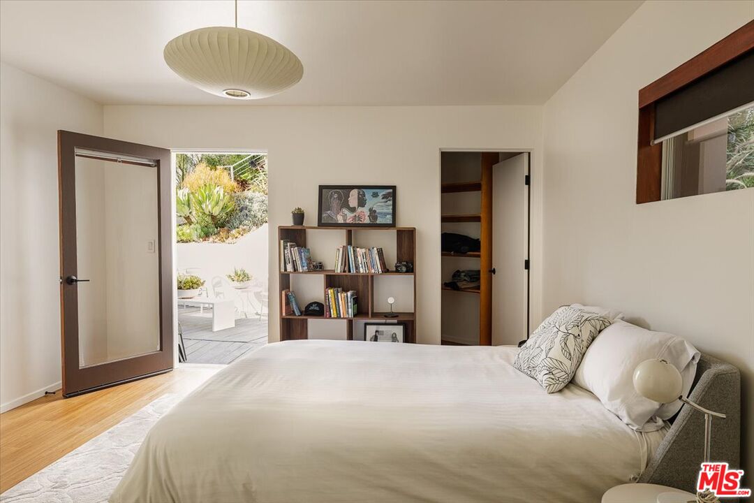 3733 Rolle Street Los Angeles, CA 90031 - Photo 18 of 36 a bedroom with a bed and wooden floor