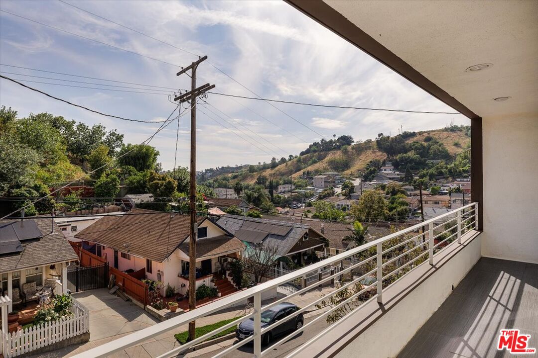 3733 Rolle Street Los Angeles, CA 90031 - Photo 5 of 36 a view of a balcony with wooden floor