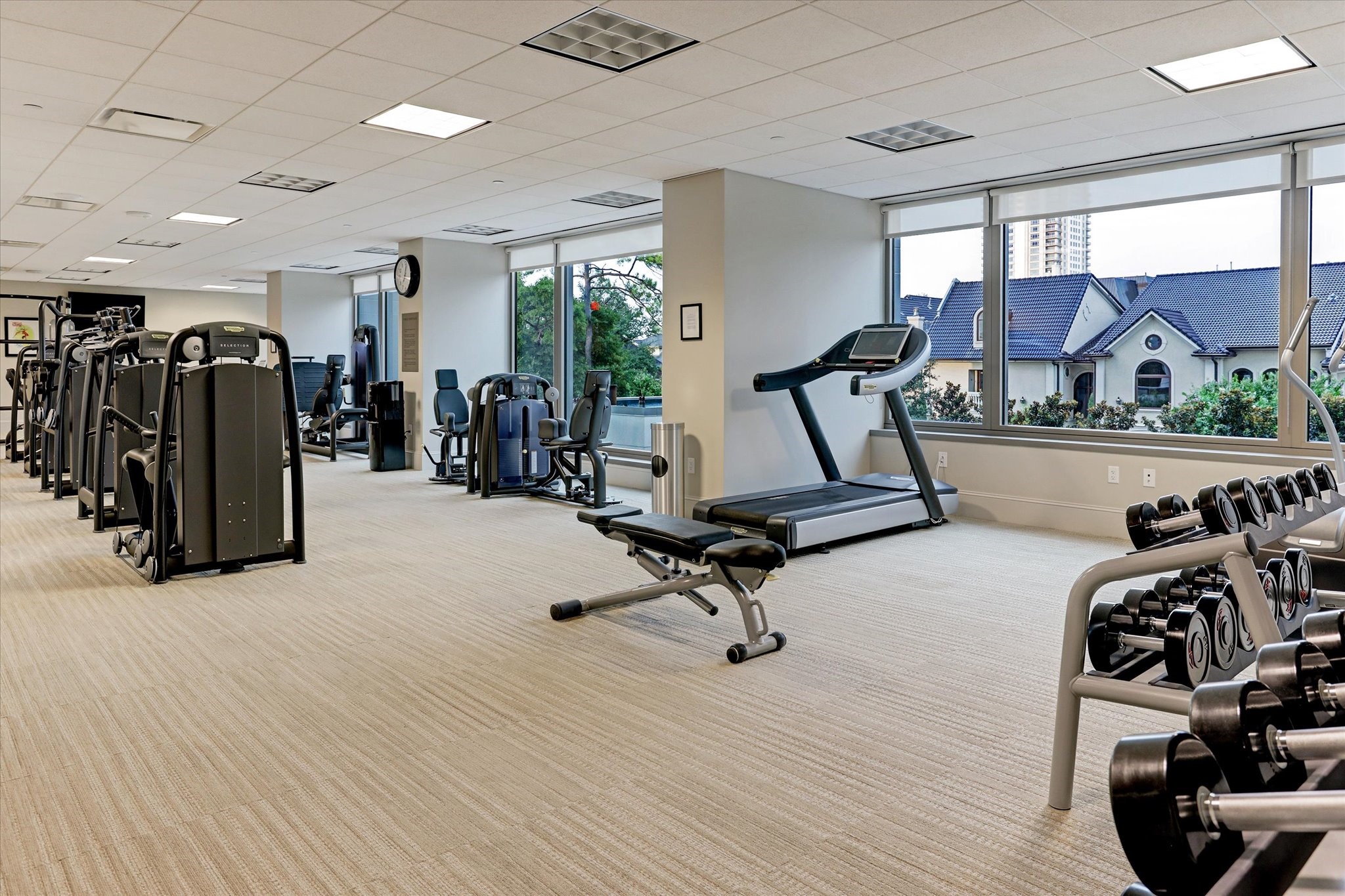 1275 South Post Oak Lane, Unit 2502 Houston, TX 77056 - Photo 7 of 8 a view of a room with gym equipment