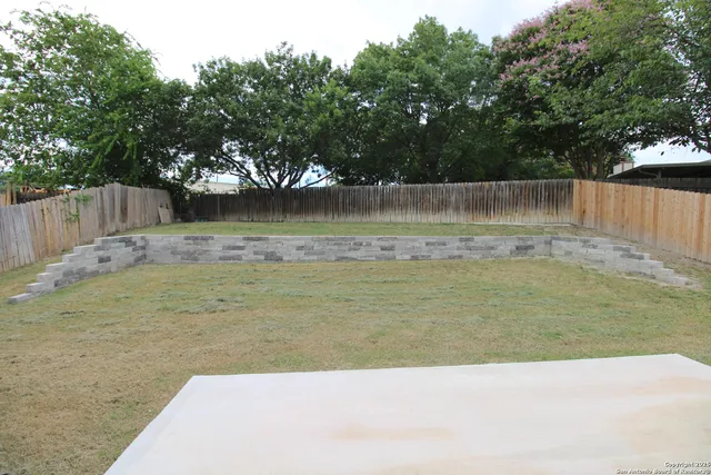 a view of a swimming pool with a lake view