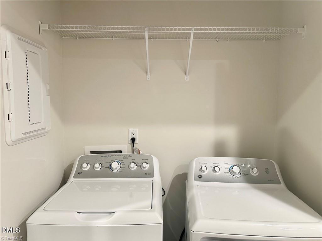 6840 Tarik Lane Raleigh, NC 27610 - Photo 15 of 27 a view of utility room with washer and dryer