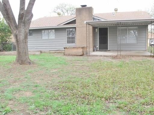 9807 Mountain Quail Road Austin, TX 78758 - Photo 19 of 19 a front view of a house with garden