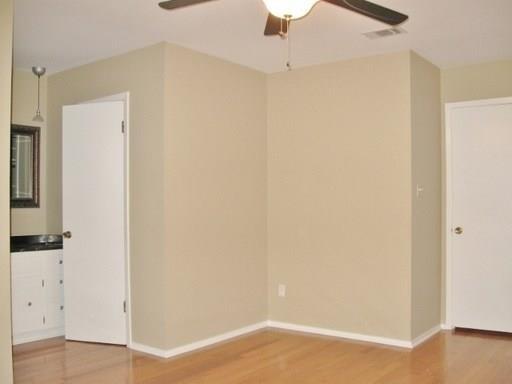 9807 Mountain Quail Road Austin, TX 78758 - Photo 10 of 19 an empty room with a hallway