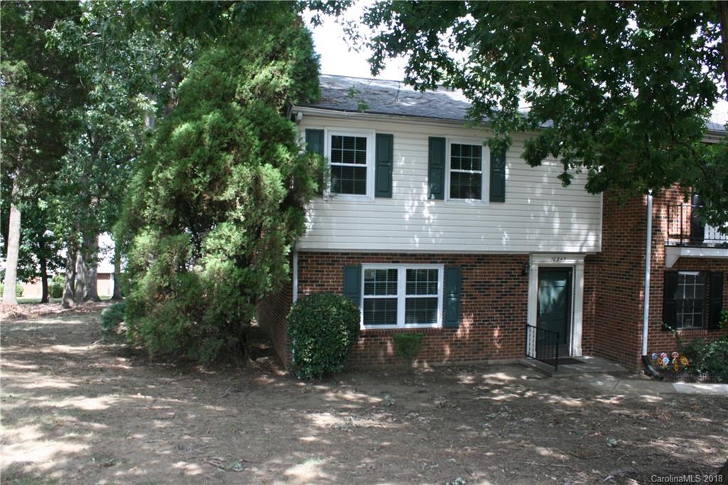 10943 Park Road Charlotte, NC 28226 - Photo 2 of 31 a view of a house with a yard