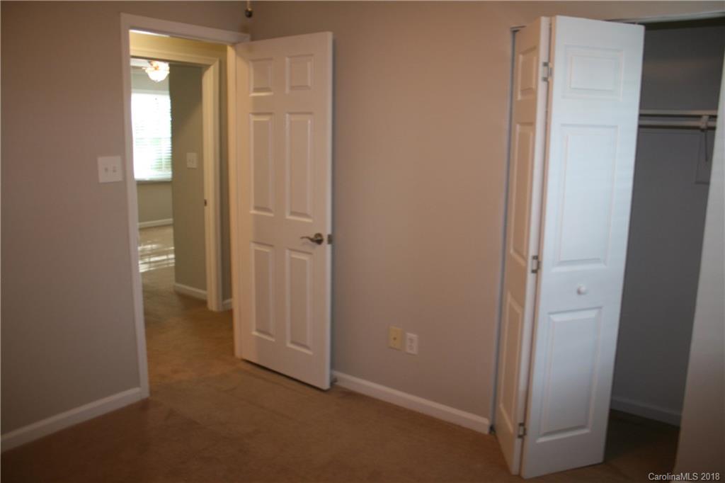 10943 Park Road Charlotte, NC 28226 - Photo 23 of 31 a view of a bathroom with a glass door