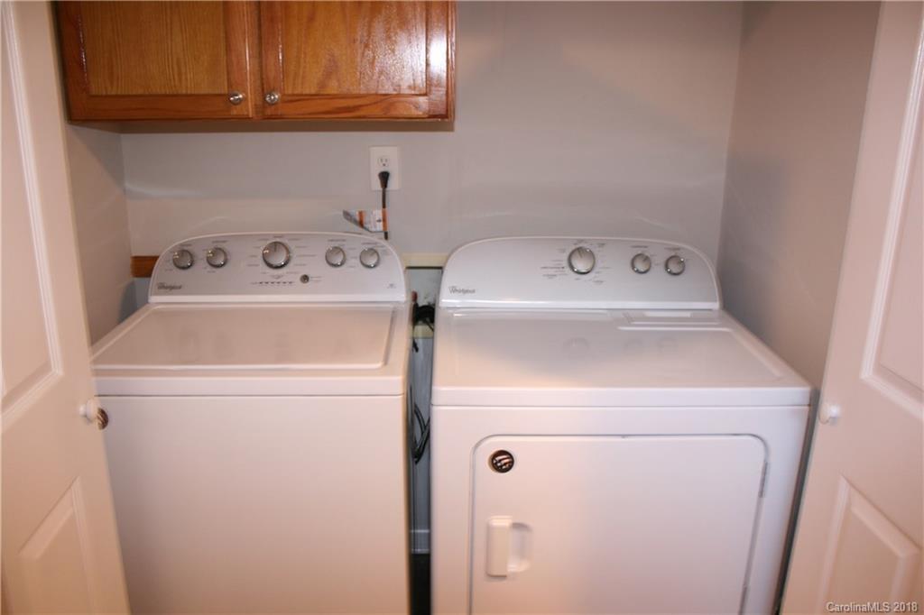 10943 Park Road Charlotte, NC 28226 - Photo 7 of 31 a utility room with dryer and washer