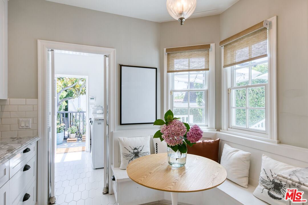 10736 Le Conte Avenue Los Angeles, CA 90024 - Photo 13 of 44 a dining room with furniture and window