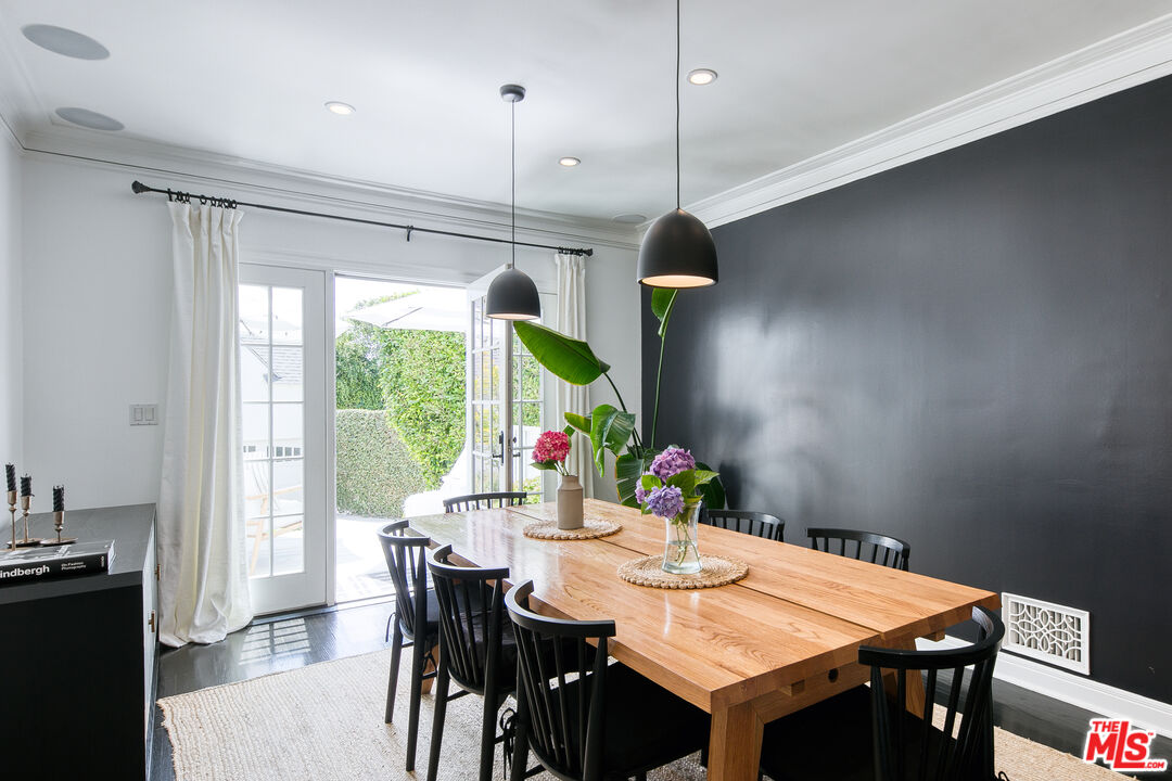 10736 Le Conte Avenue Los Angeles, CA 90024 - Photo 15 of 44 a view of a dining room and a table chairs