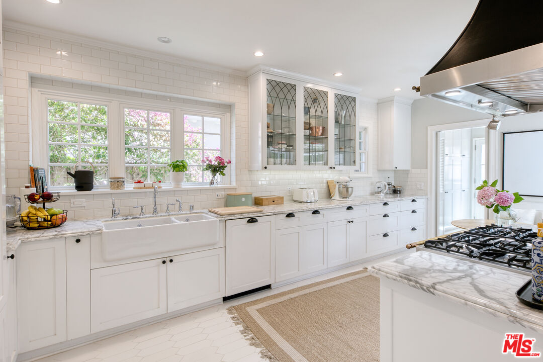 10736 Le Conte Avenue Los Angeles, CA 90024 - Photo 10 of 44 a kitchen with sink stove and window