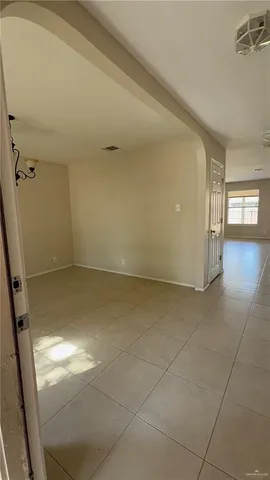 a view of a small space with racks on the wall