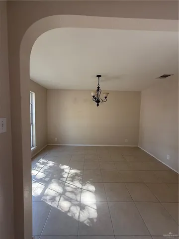 a view of a small space with racks on the wall