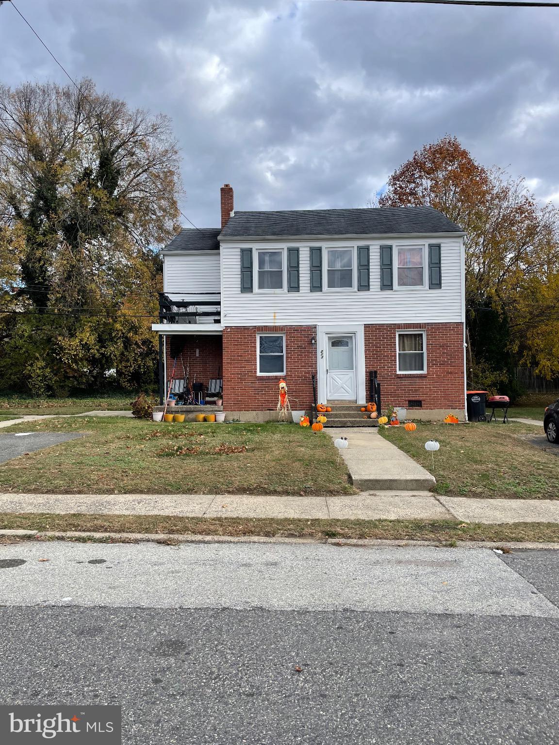 213 Gray Street Chester, PA 19013 - Photo 1 of 38 front view of a house with a yard