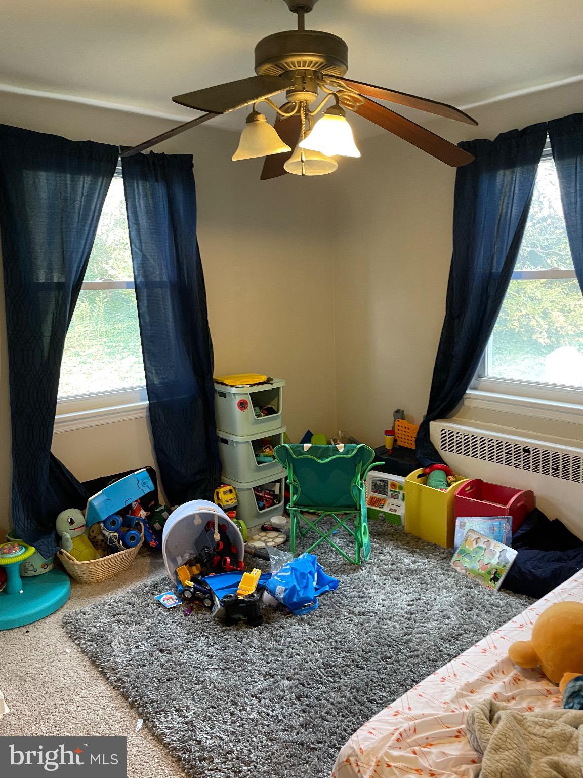 213 Gray Street Chester, PA 19013 - Photo 16 of 38 a room with toys and dresser