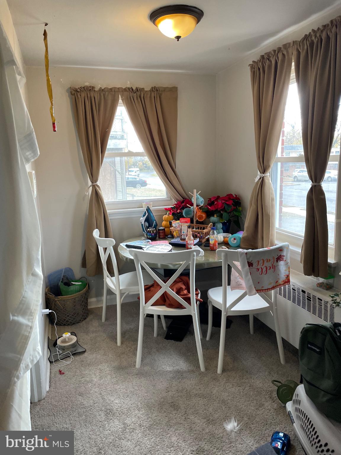 213 Gray Street Chester, PA 19013 - Photo 18 of 38 a dining room with furniture and a window