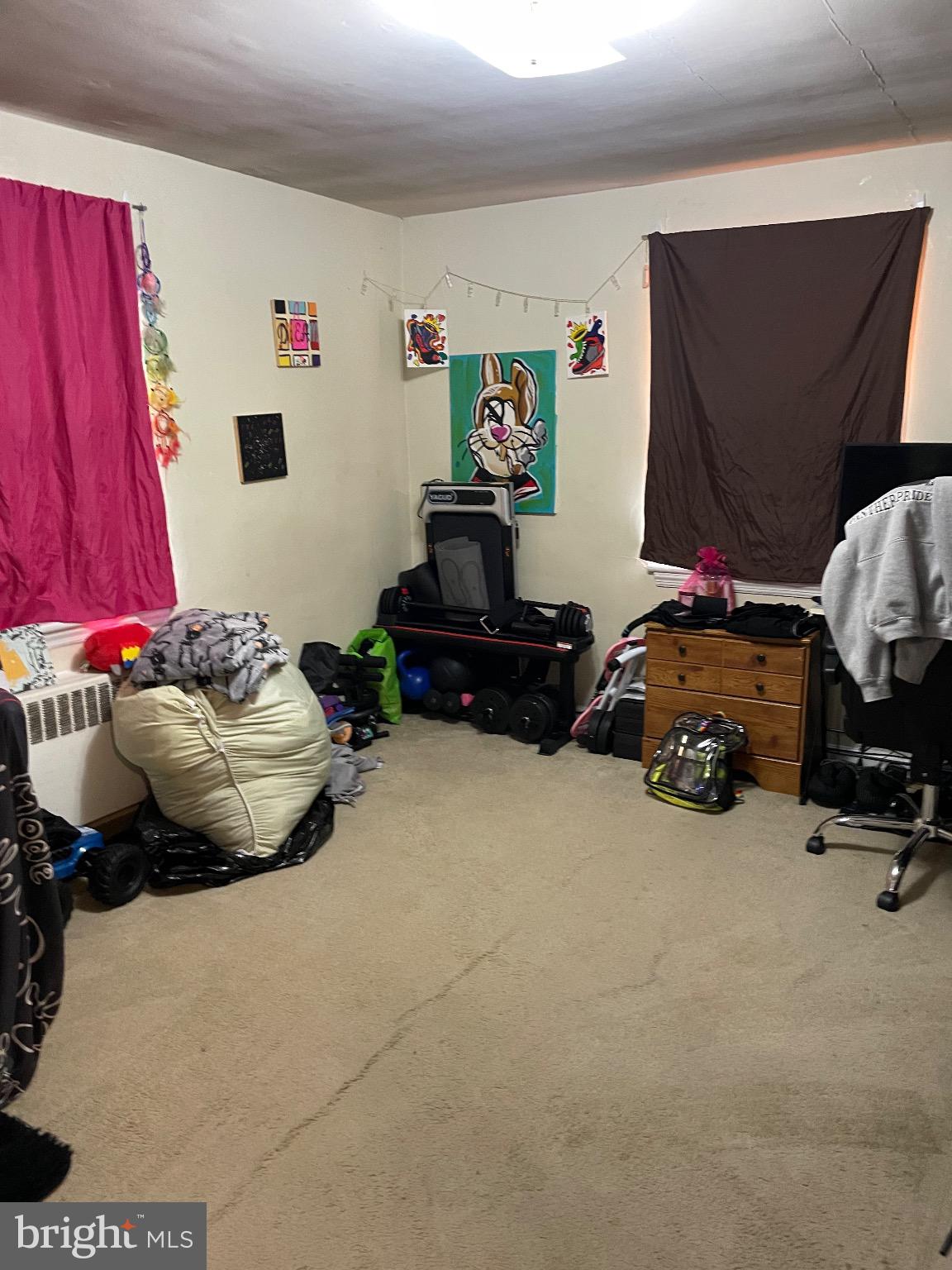 213 Gray Street Chester, PA 19013 - Photo 25 of 38 a bedroom with a bed and a couch