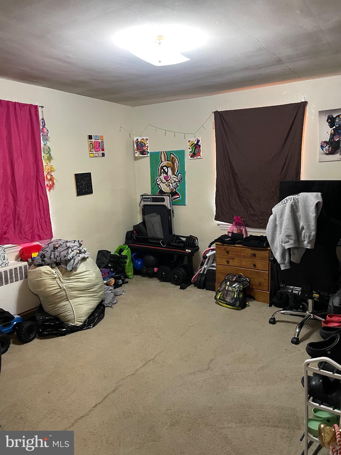 213 Gray Street Chester, PA 19013 - Photo 27 of 38 a room with toys and a bed