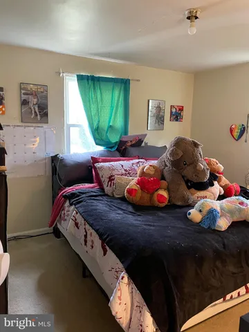 a bedroom with furniture and a bed