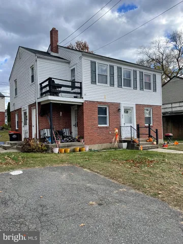 a view of outdoor space yard and front view of a house