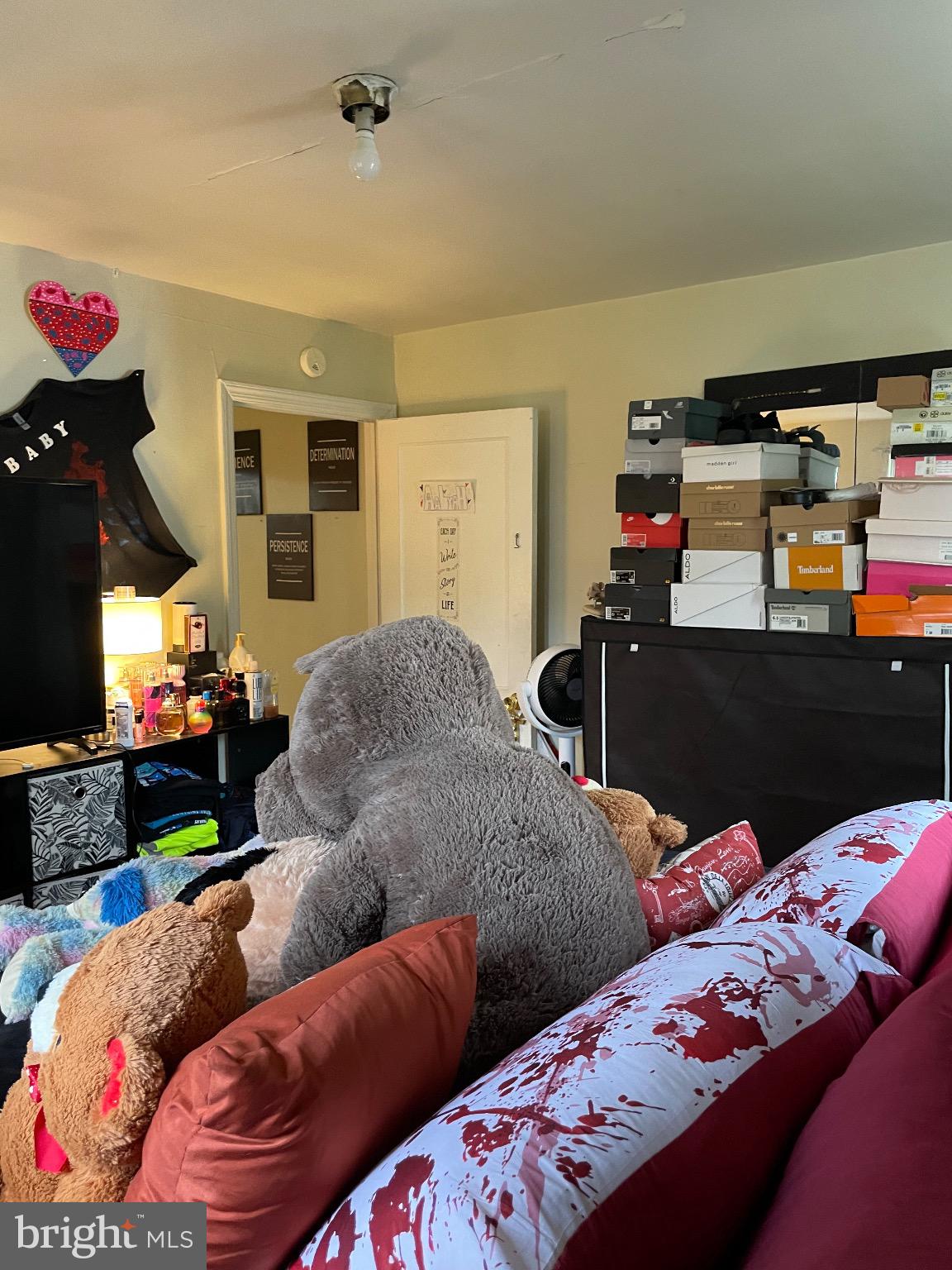 213 Gray Street Chester, PA 19013 - Photo 31 of 38 a living room with furniture and a flat screen tv