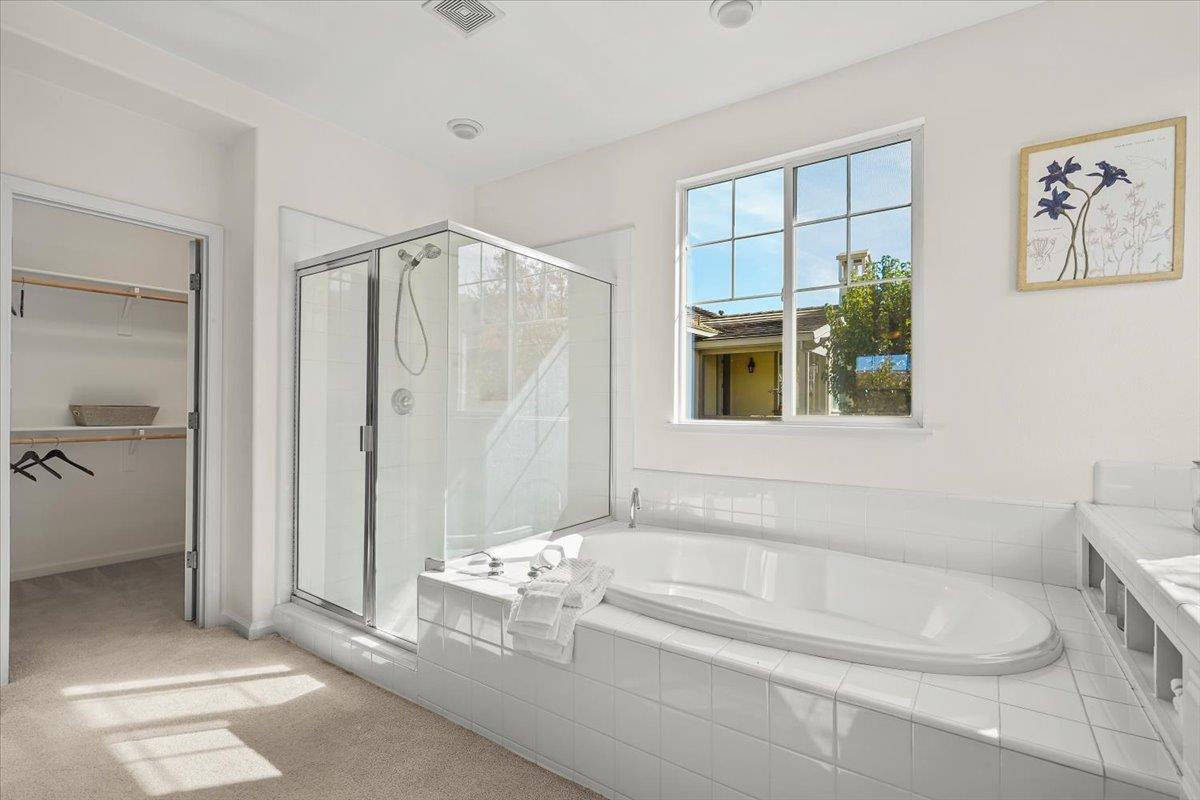 2144 Gullane Way Gilroy, CA 95020 - Photo 12 of 22 a bathroom with a bathtub and a shower