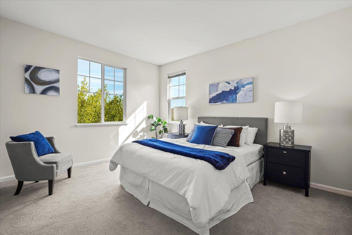 2144 Gullane Way Gilroy, CA 95020 - Photo 13 of 22 a spacious bedroom with a bed and a chair