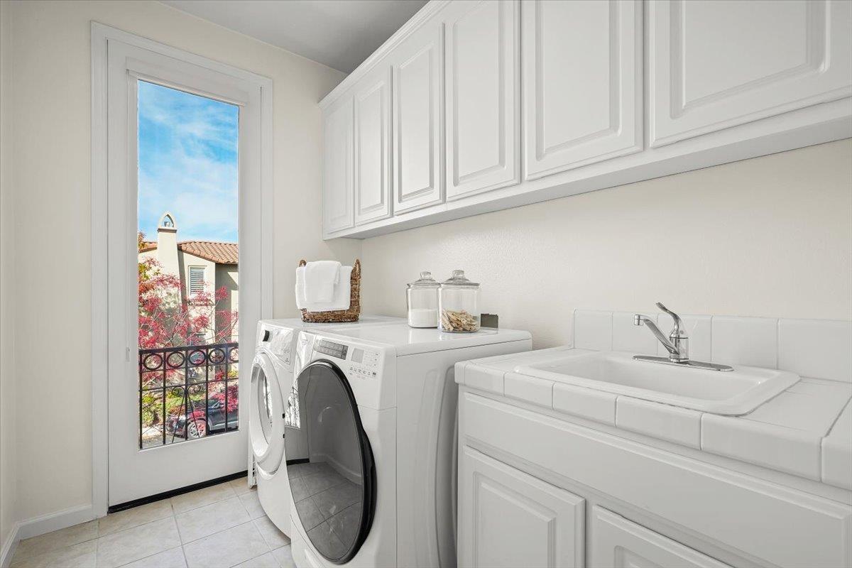 2144 Gullane Way Gilroy, CA 95020 - Photo 17 of 22 a utility room with dryer and washer