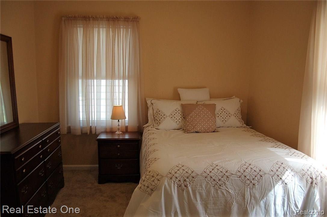 200 Mohawk Road Pontiac, MI 48341 - Photo 15 of 22 Spacious entry level bedroom. Again, everything is new.