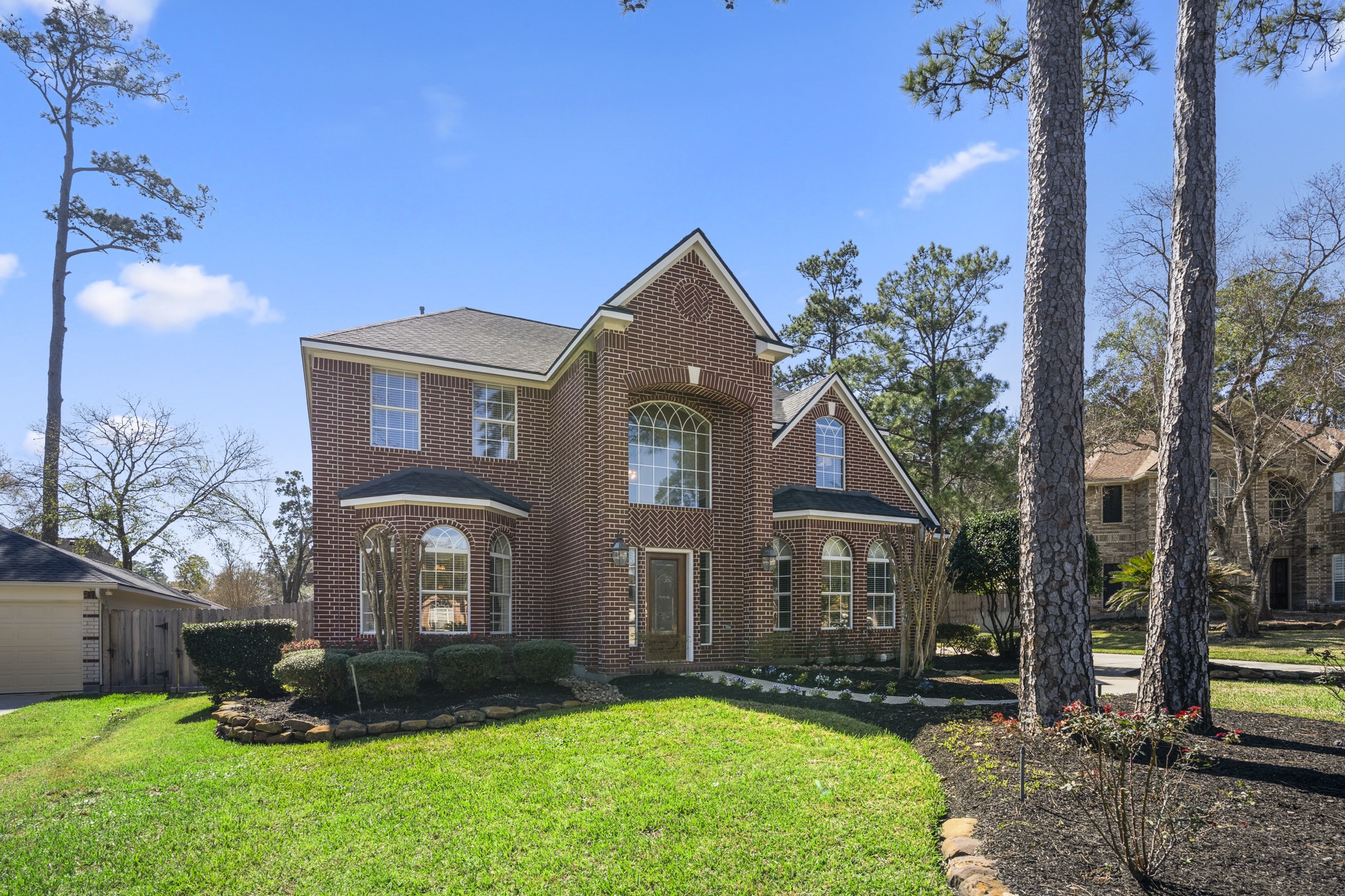 Welcome home to 6615 Haughton Drive. We begin our tour here, where the two-story brick façade and mature trees create a truly grand first impression. There’s an elegance to the way this home greets you — refined, inviting, and right at home in Northampton Forest.

Now, let’s step back and take in how it sits on its spacious cul-de-sac lot.