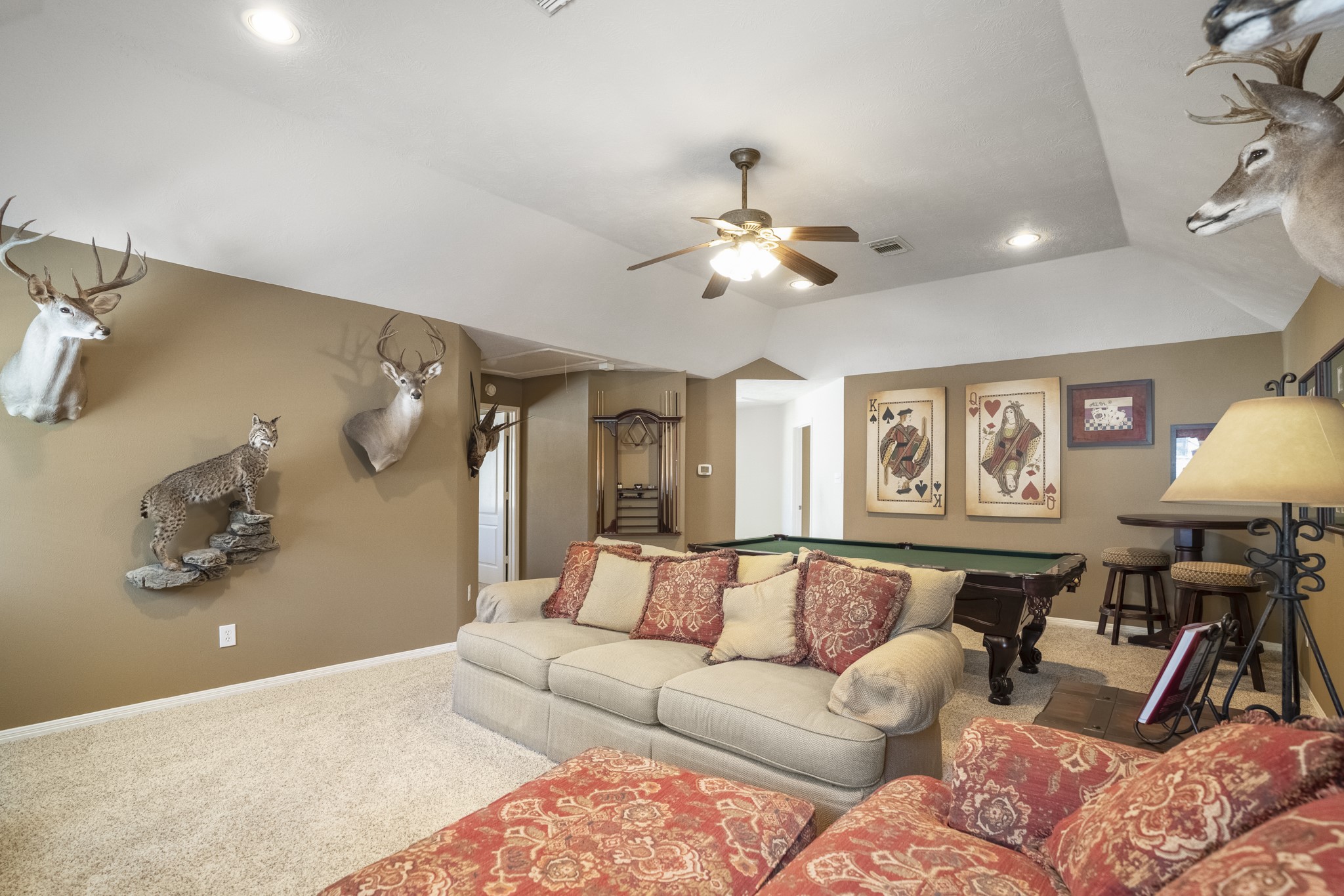6615 Haughton Drive Spring, TX 77389 - Photo 28 of 50 One last look at the upstairs game room before we move on. It’s a space that feels easy and lived-in — tucked away from the main level, yet central to the bedrooms that surround it. Whether it becomes a movie room, a game space, or simply a second living area, it adds another layer to how this home functions day to day.