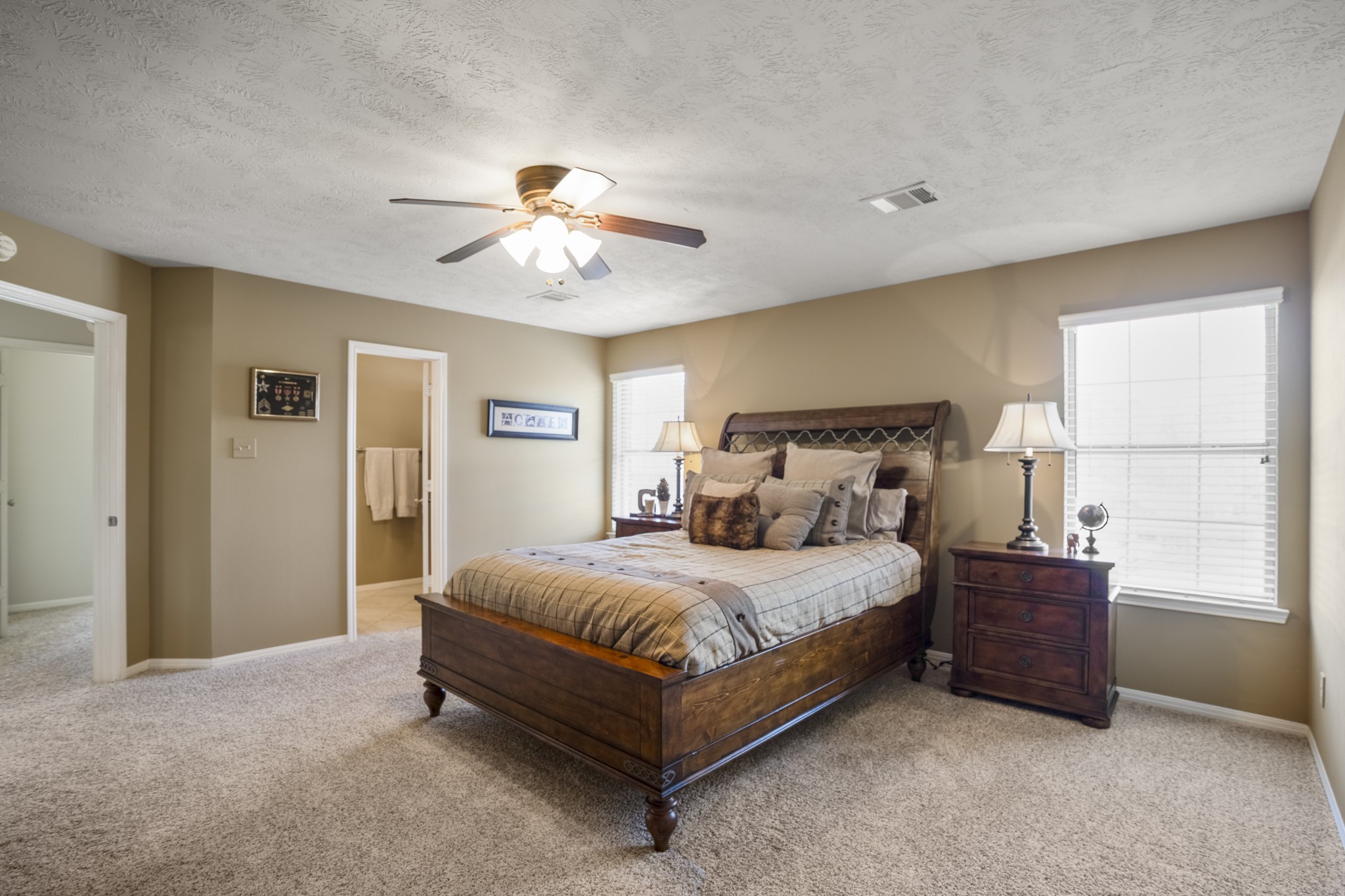 6615 Haughton Drive Spring, TX 77389 - Photo 32 of 50 From this side of the room, you can see the doorway that connects directly to a full bath, adding convenience to the layout upstairs.