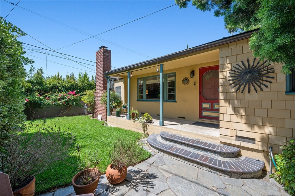 9066 Rancho Real Road Temple City, CA 91780 - Photo 1 of 1 a backyard of a house with seating space