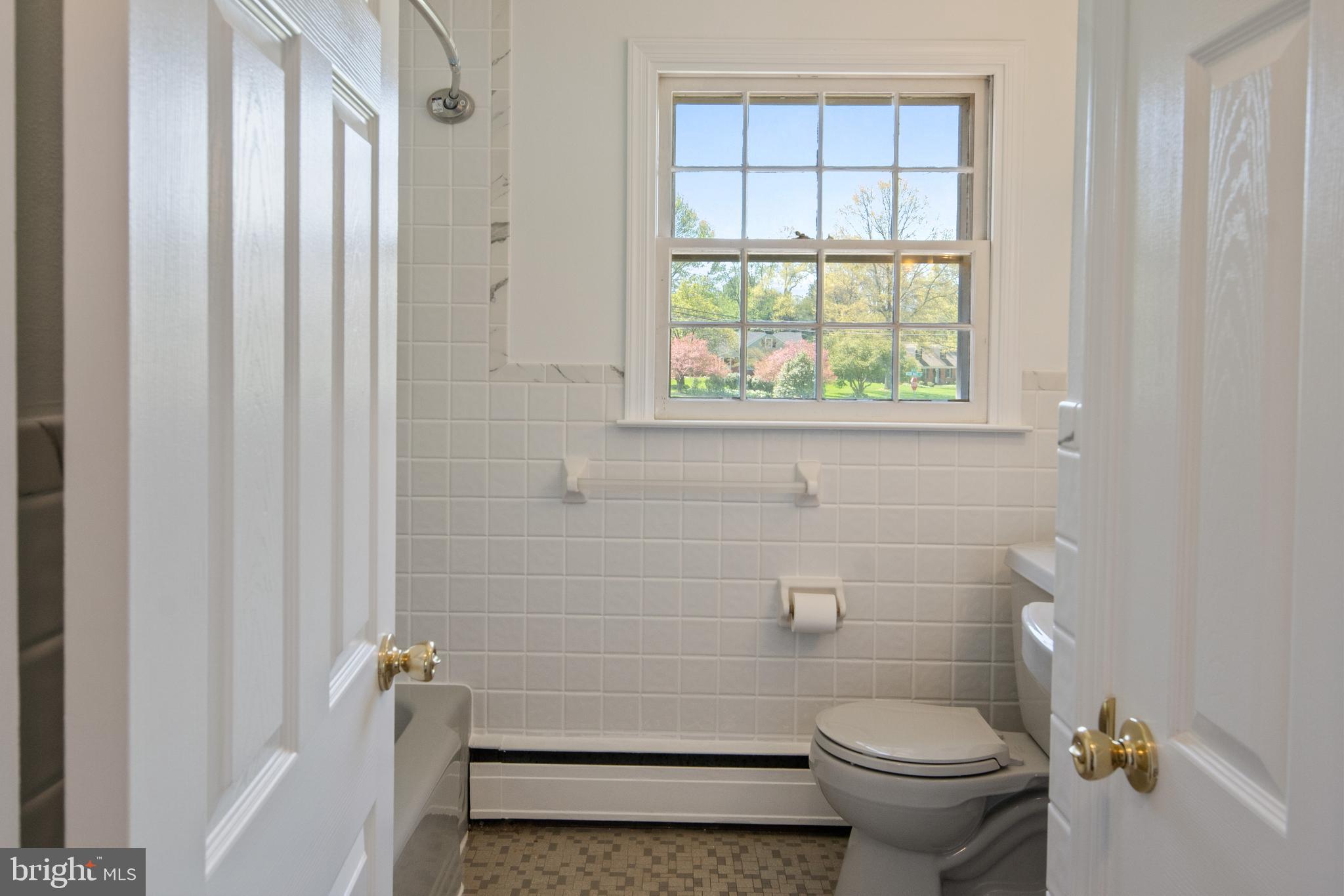97 Lamp Post Road Doylestown, PA 18901 - Photo 18 of 30 First Floor Hall Bath with Tub