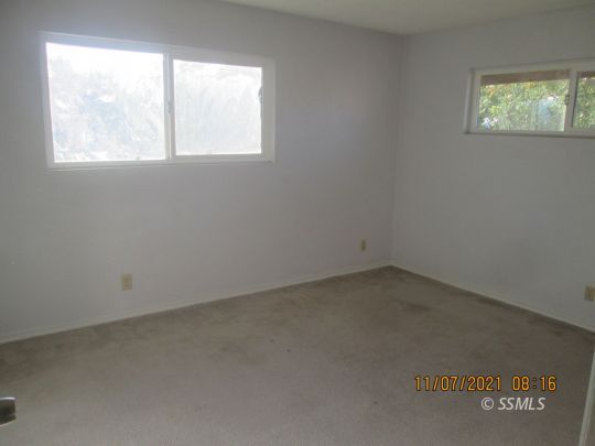 227 South Springside Street Ridgecrest, CA 93555 - Photo 8 of 22 an empty room with a window