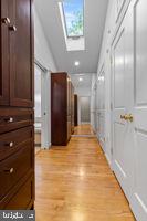 9613 Brunett Avenue Silver Spring, MD 20901 - Photo 40 of 52 Primary bathroom closet space and bathroom entry