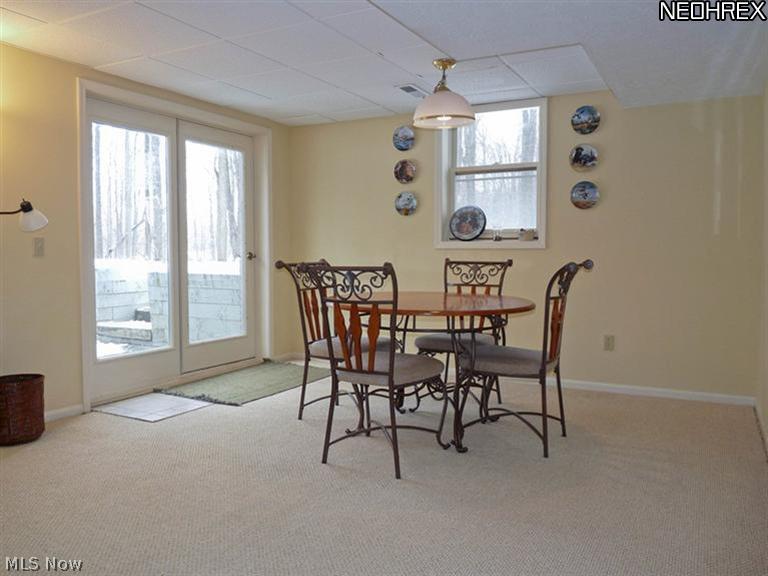 16532 Haskins Road Bainbridge, OH 44023 - Photo 9 of 19 INFORMAL DINING OR GAMES IN THIS AREA OF THE WALKOUT LOWER LEVEL.