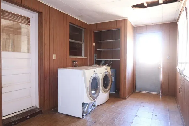 a utility room with dryer and washer