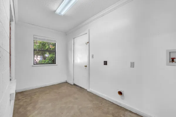 a view of backyard with small cabin