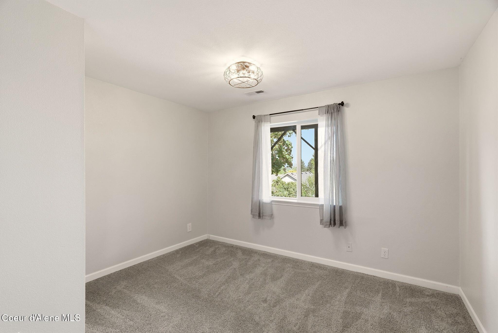 2795 North Rawhide Ridge Road Post Falls, ID 83854 - Photo 29 of 43 Downstairs Bedroom